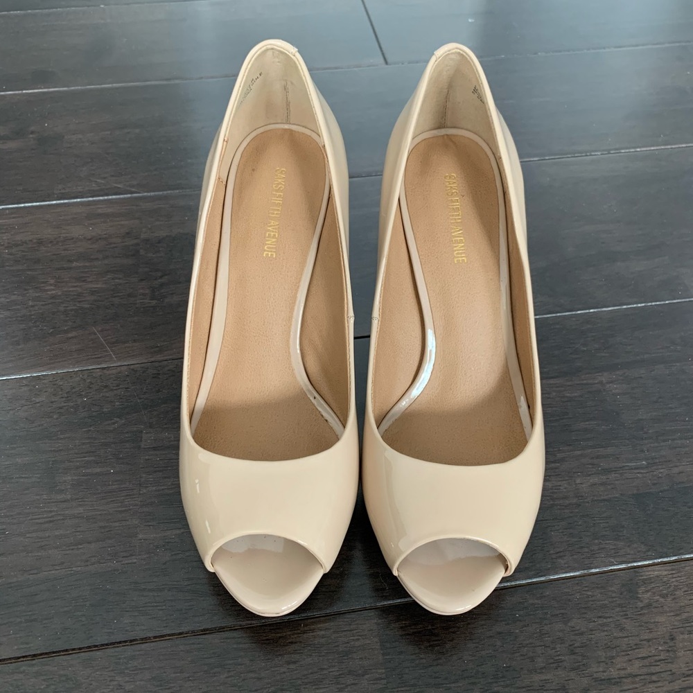 Nude open toed pumps